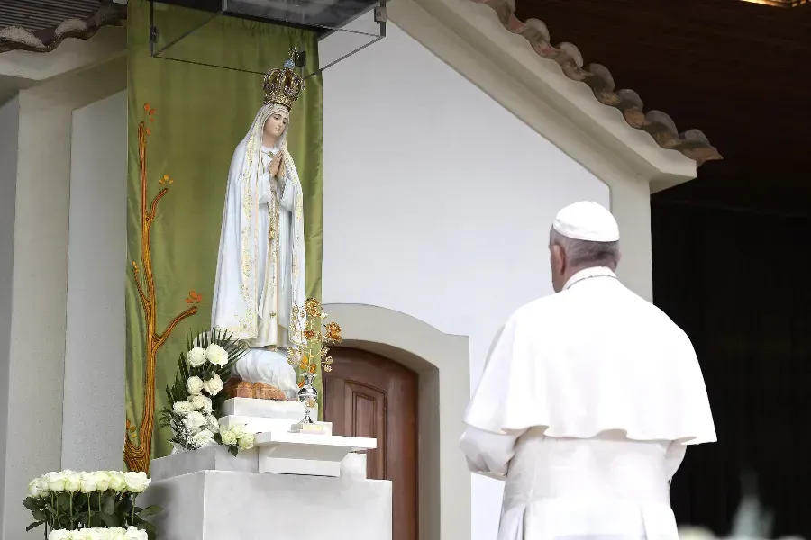 Pope Francis prays at the Sanctuary of Our Lady of Fatima in Portugal on May 12, 2017. Vatican Media.