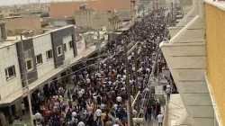Environ 25 000 chrétiens de Qaraqosh ont participé à la procession du dimanche des Rameaux le 10 avril 2022. CREDIT : Bashar Yameel Hanna/CNA / 